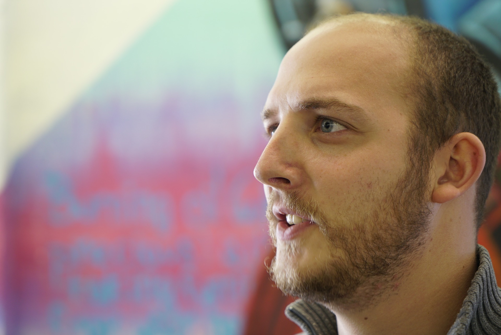 Man in side view photo with his beautiful beard