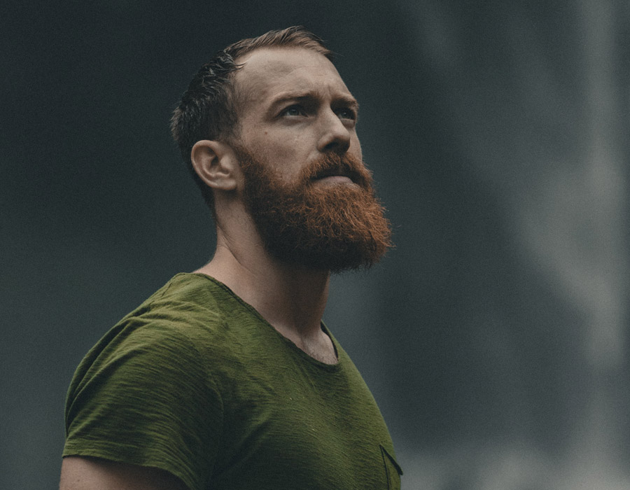 bearded man lookin up