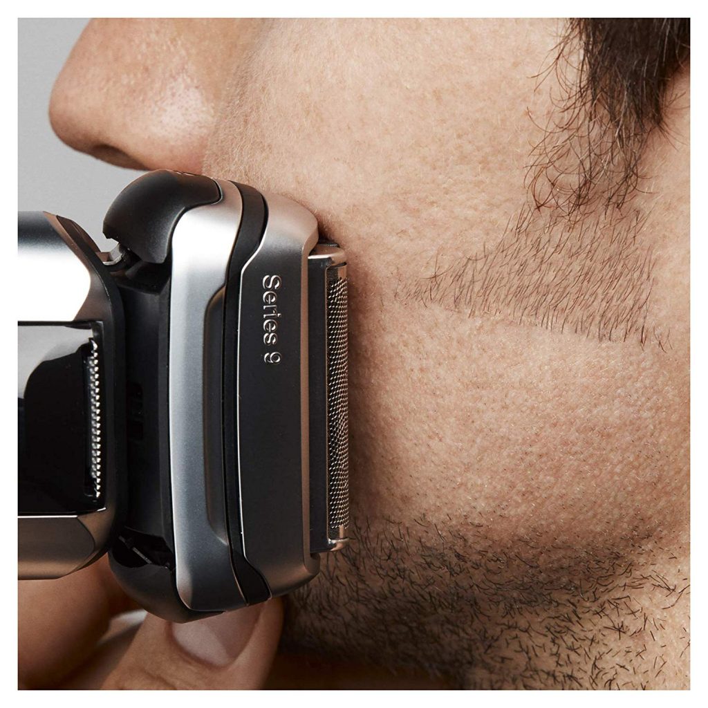 man using the Braun Series 9 to trim his beard